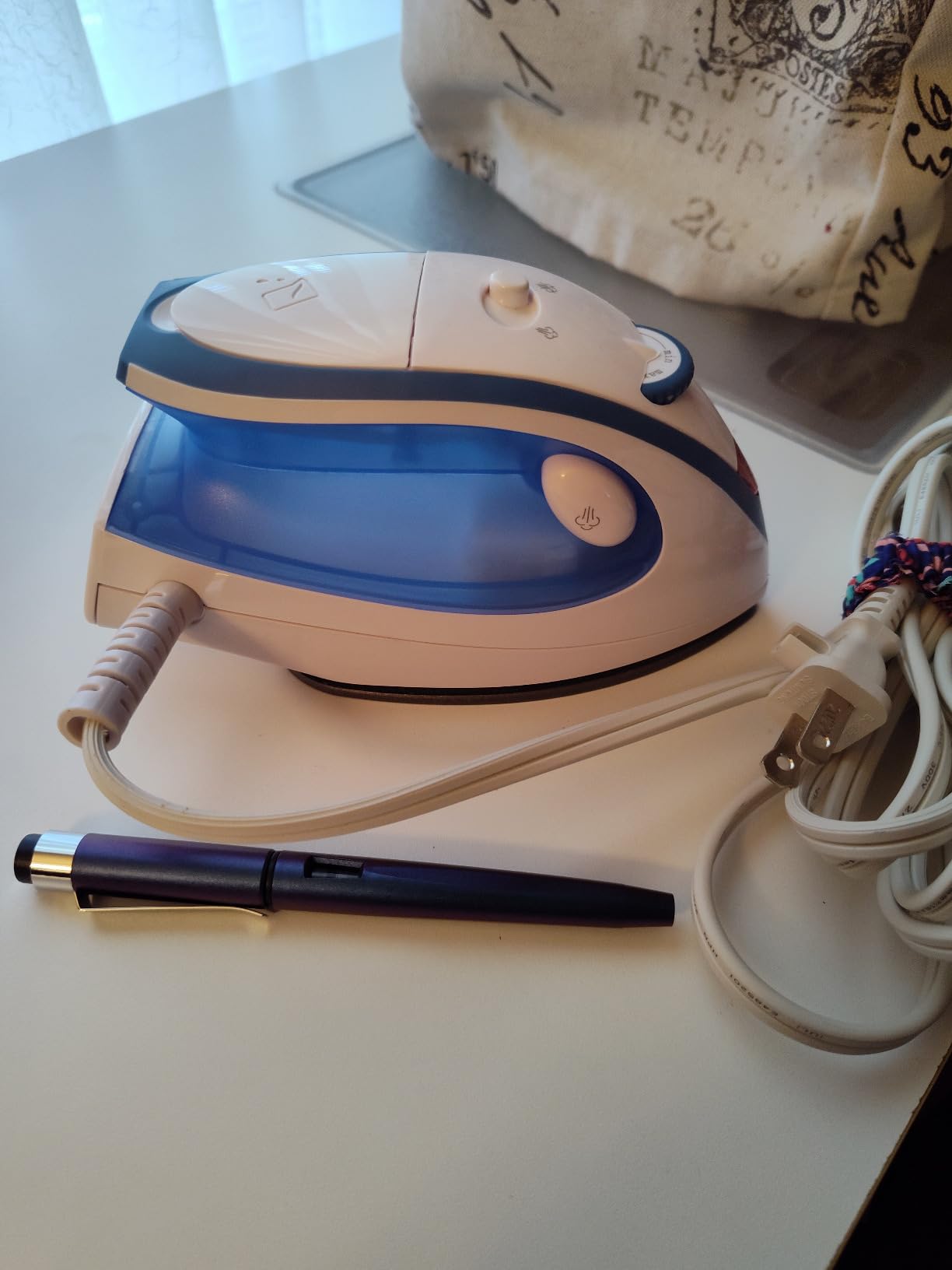 Sunbeam Hot-2-Trot Travel Steam Iron, 800 Watt Dual Voltage 120/240, Compact Size, Portable, Non-Stick Soleplate, Soft Touch Handle, Horizontal or Vertical Use, White and Blue customer photo 2