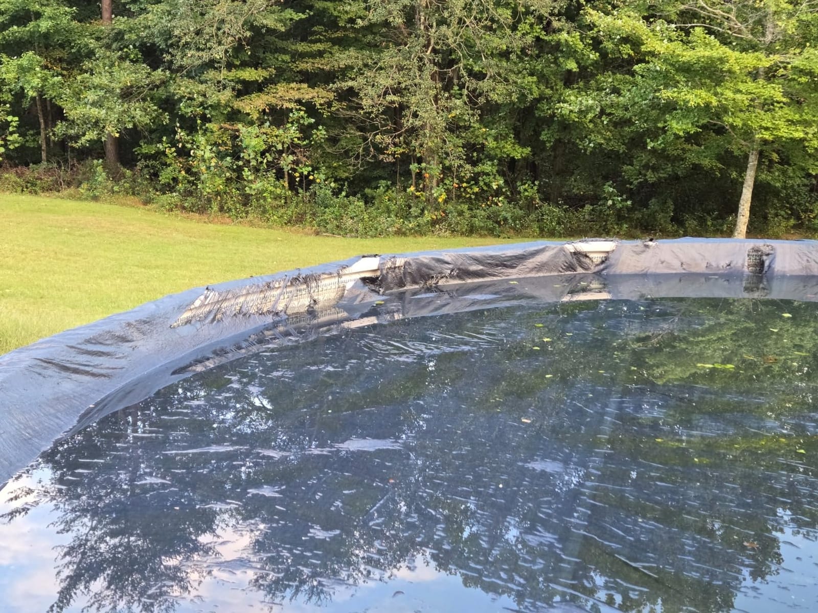 Blue Wave Arctic Armor 24-ft Round Above Ground Pool Winter Cover, Navy | Solid polyethylene, heat-sealed seams, cable, winch, grommets, extra 4-ft overlap, 8-yr support, blocks debris & snow customer photo 1