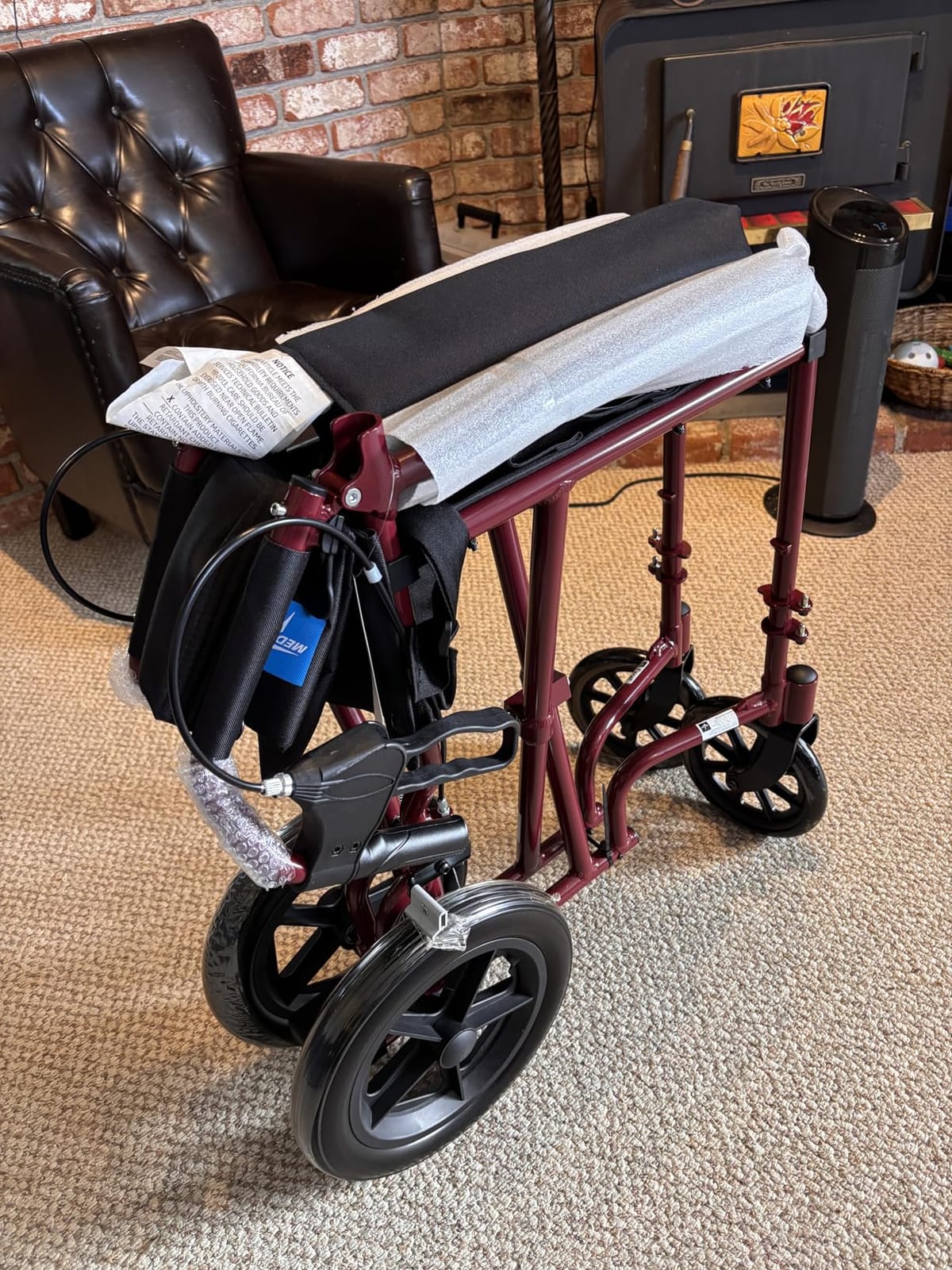 Medline Lightweight Foldable Transport Wheelchair with Handbrakes and 12-Inch Wheels, Blue Frame, Black Upholstery customer photo 1