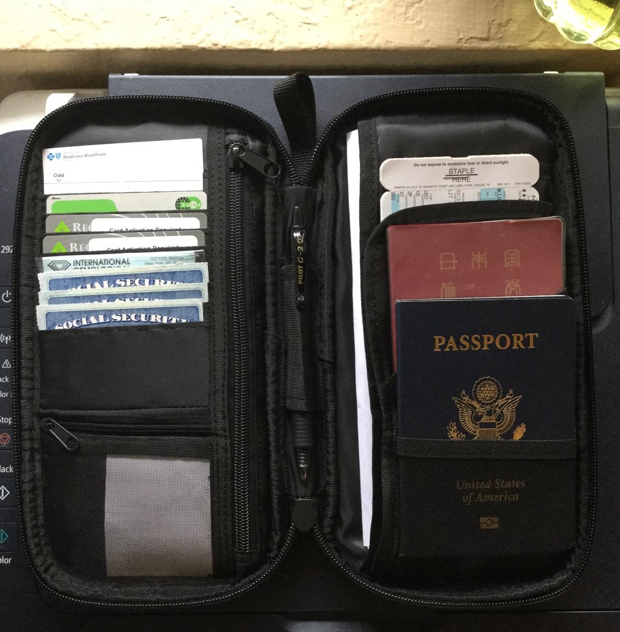 Amazon Basics RFID-blocking Passport Wallet, Passport Holder for Travel, Polyester/Nylon Material with Durable Zipper Closure customer photo 1