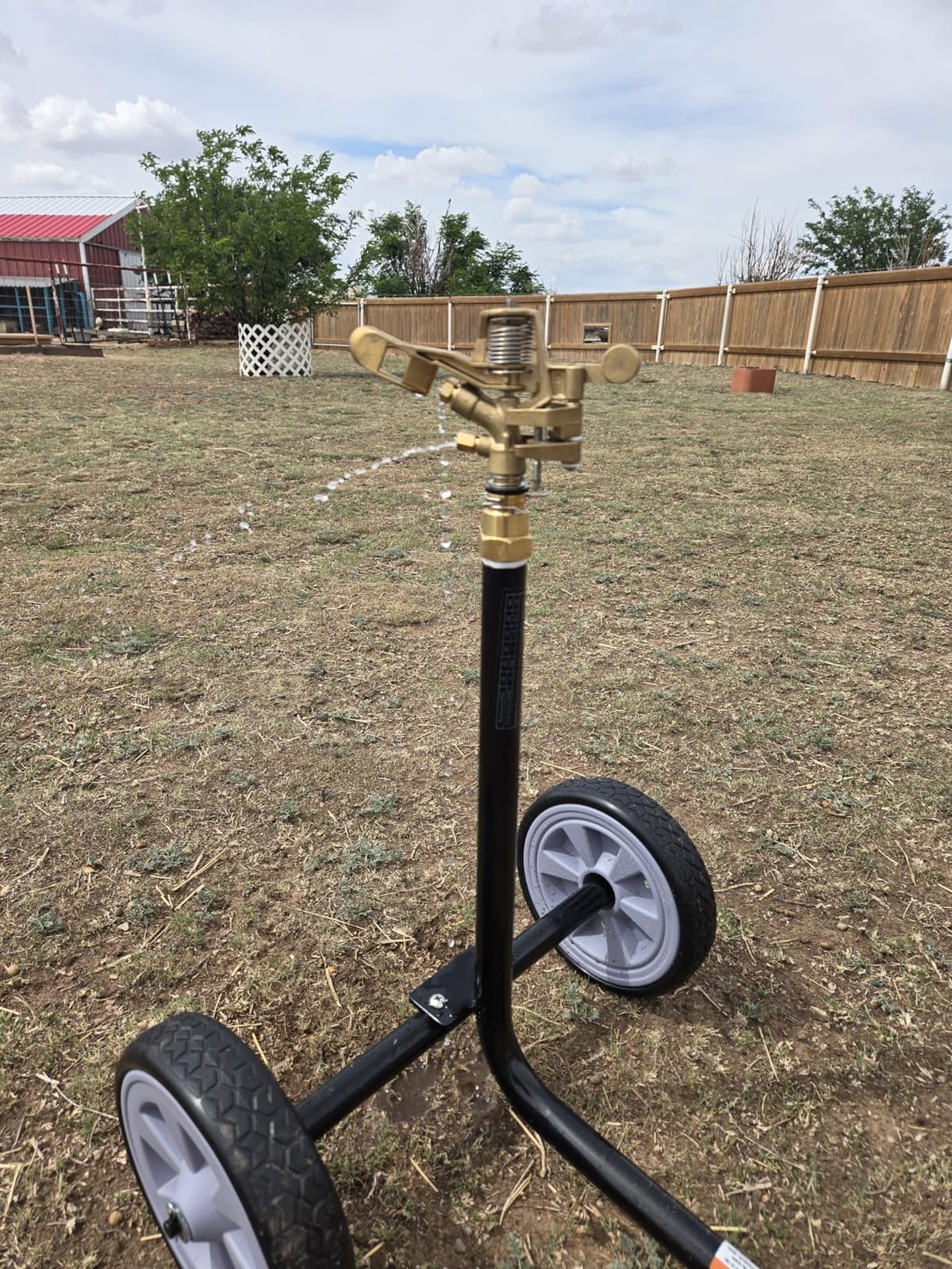 Strongway Wheeled Sprinkler, 63 GPM, 5 Nozzles, 150ft. Coverage | 1-1/4in. die-cast aluminum head, 10in. flat-free tires, Easy movement across large properties, Durable outdoor use customer photo 1