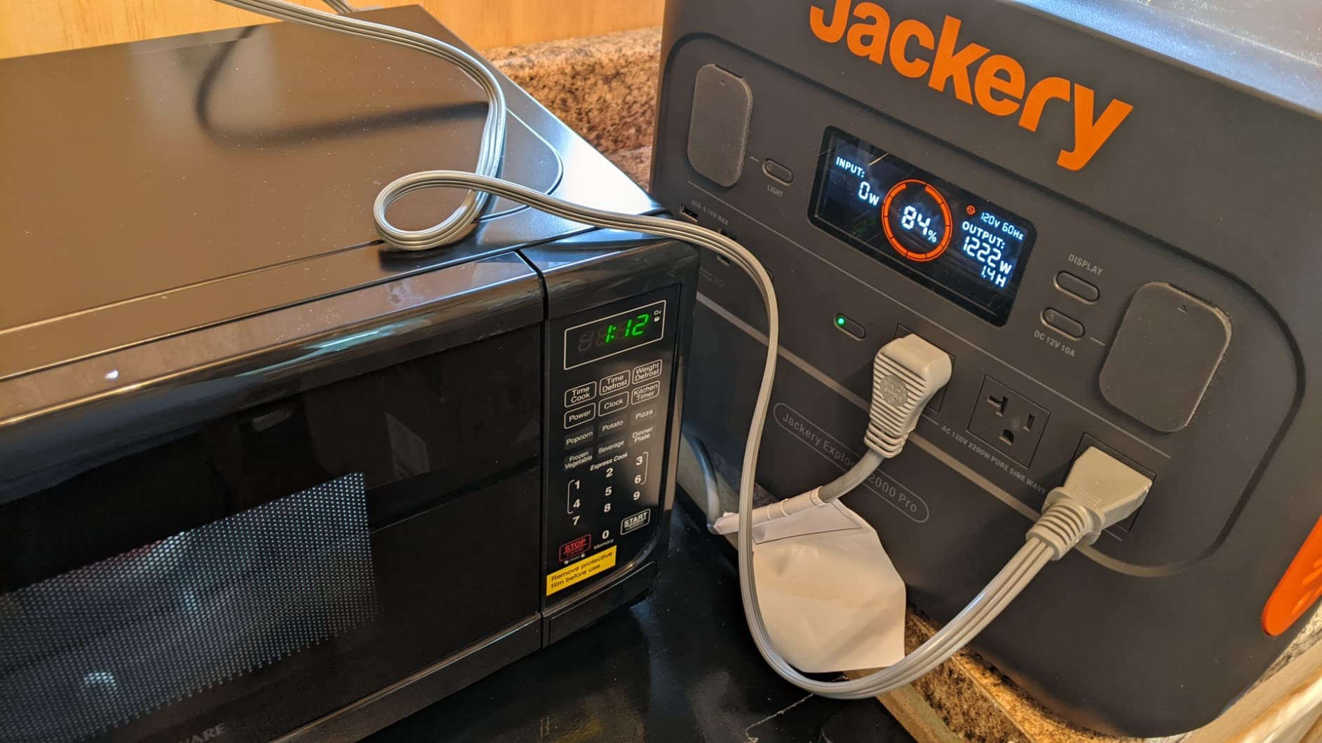 Farberware 0.7 Cu. Ft. Countertop Microwave Oven - 700 Watts Power, Auto Cook Settings, Defrost, Easy Clean and Child Safety Lock - Black customer photo 2