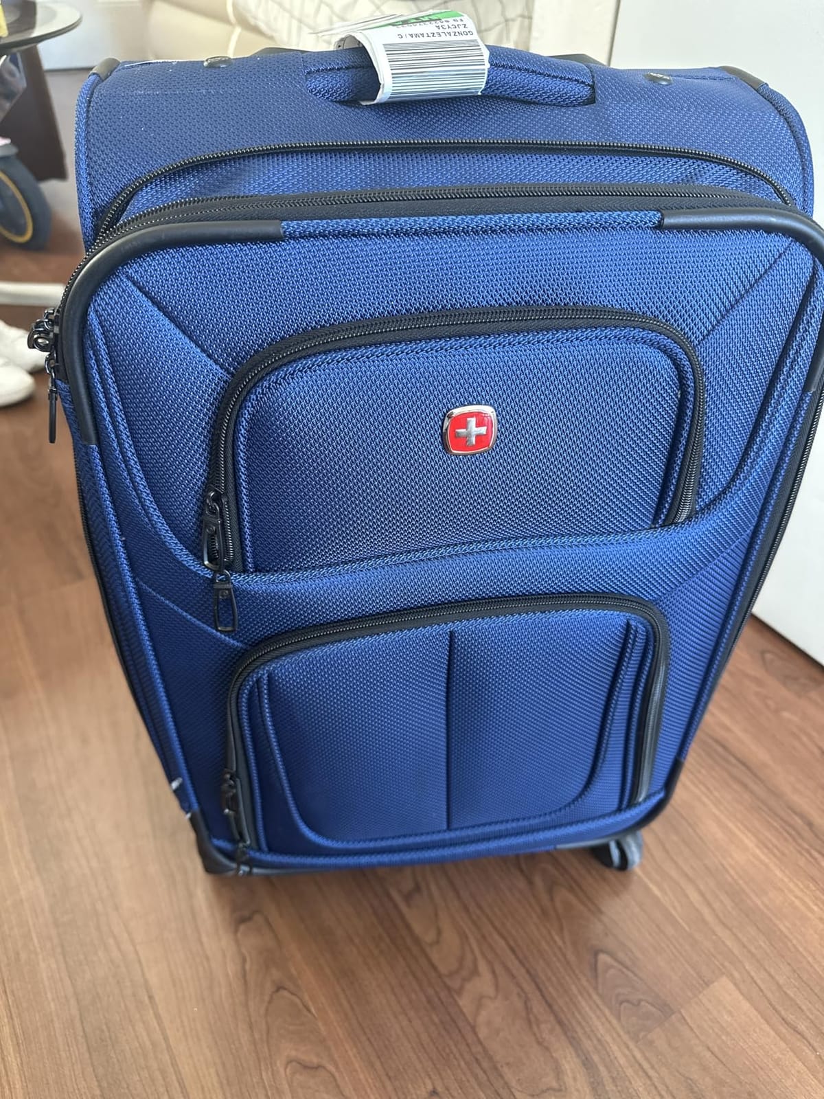 SWISSGEAR Sion Carry-On Spinner Luggage, Softside Expandable, Lightweight Suitcase, Teal, 22.75-Inch customer photo 2