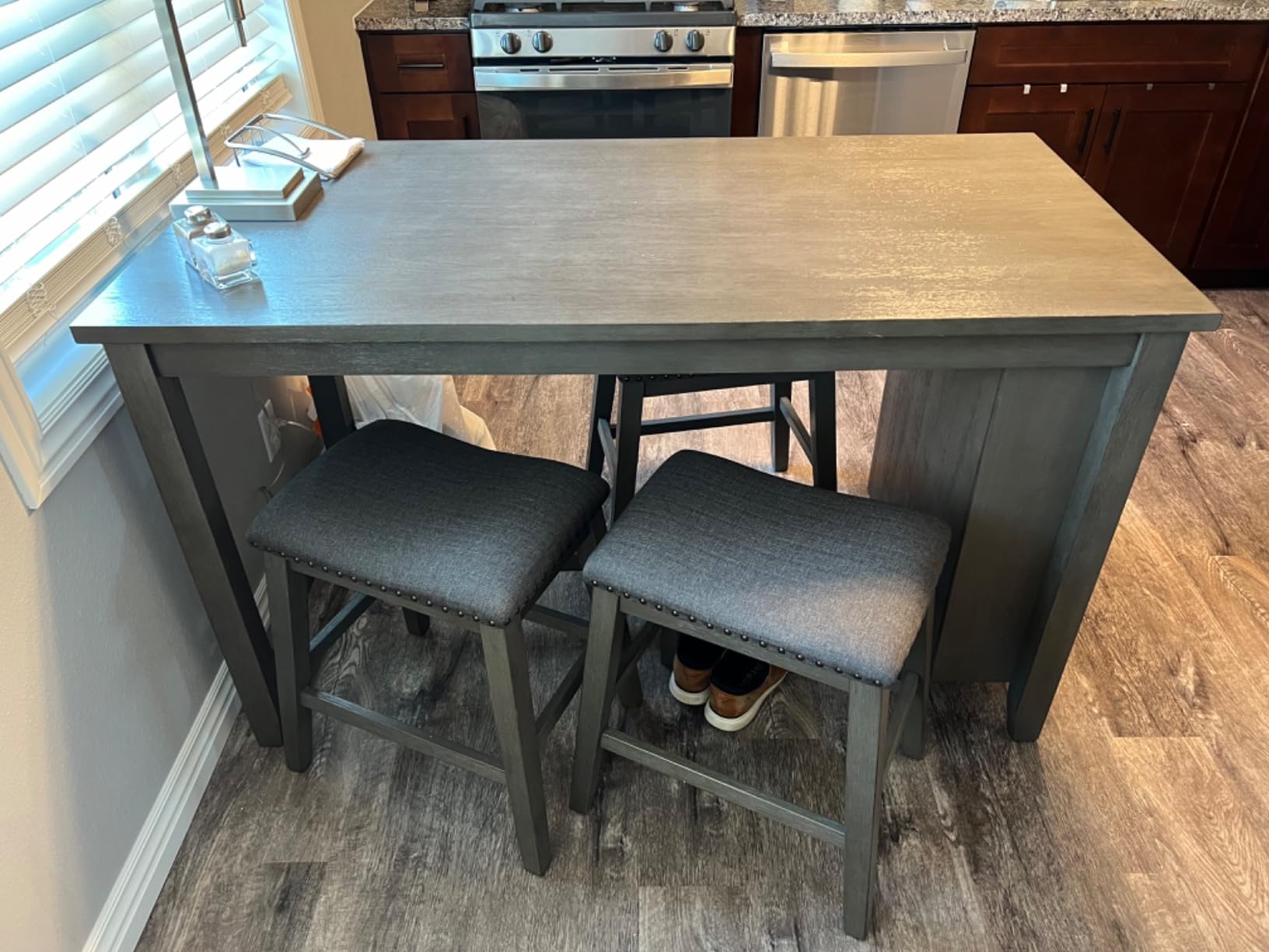 Signature Design by Ashley Skempton Counter Height Bar Stool, Set of 2 | Space-saving 24-inch farmhouse design, Supportive 18.5-inch foam-cushioned saddle seat, Distressed wood frame with footrest customer photo 2