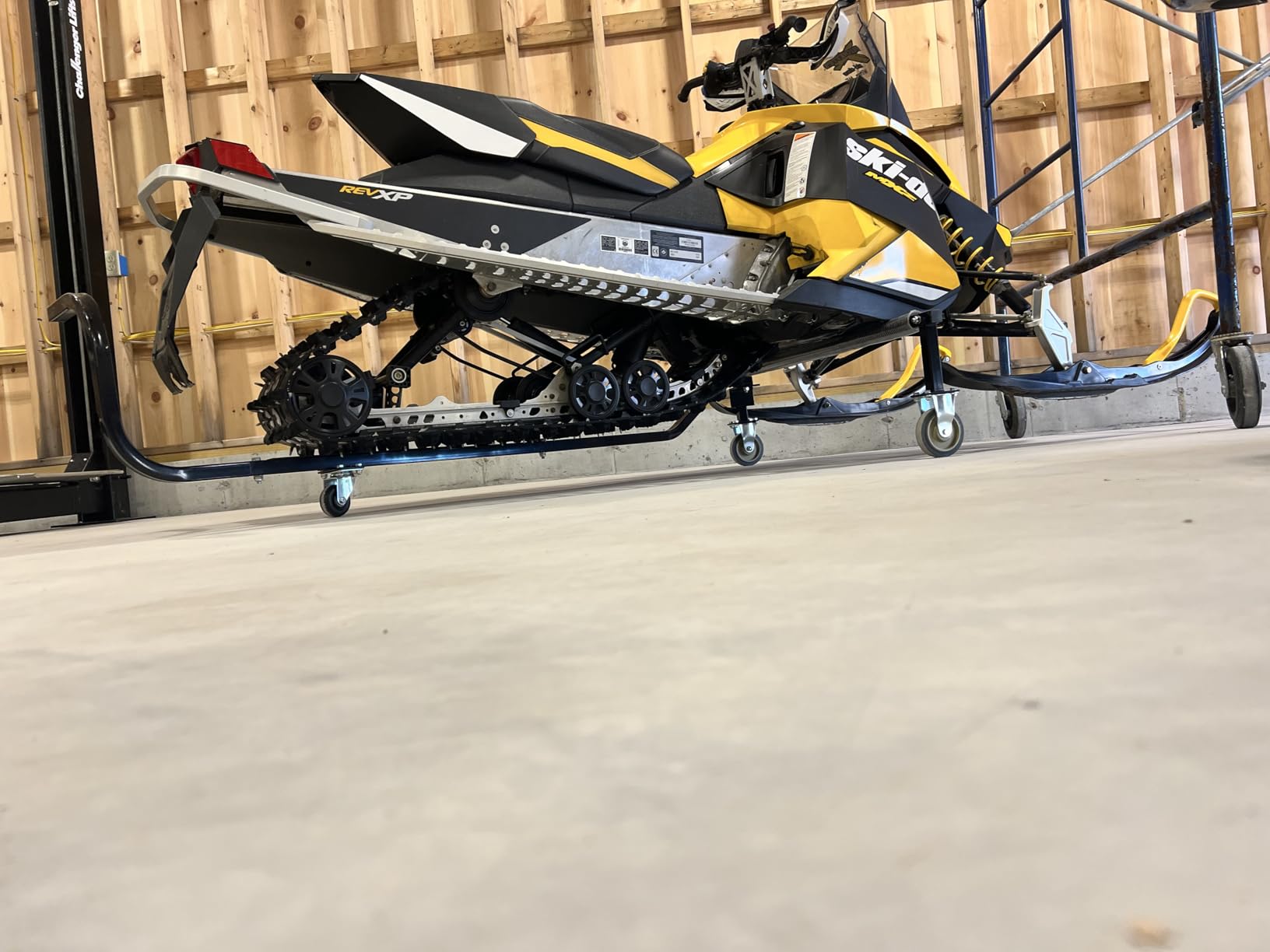 Black Ice Snowmobile Dolly, Steel Lift, 1,500 lb Cap, Folding | Heavy-duty powder-coated steel, large casters & long lever handle for moving and storing most snowmobiles, shop, garage customer photo 1