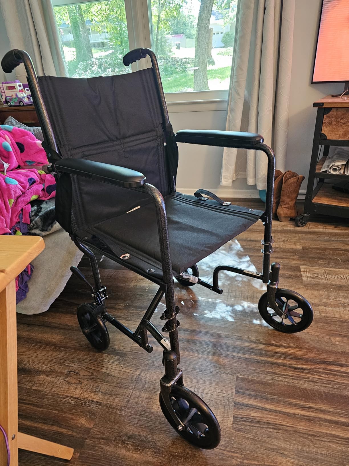 Medline Durable Folding Steel Transport Wheelchair with Swing-Away Footrests, 19-Inch Seat Width, Black Frame, Black Upholstery customer photo 1