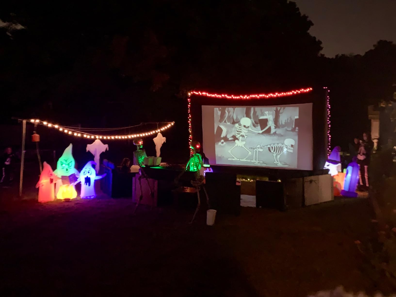 GYUEM 20 feet Inflatable Portable Projector Movie Screen - Huge Air-Blown Cinema Projection Screen Package with Rope, Blower, Tent Stakes - Front & Rear Projection, for Outdoor Party Backyard Pool Fun customer photo 1