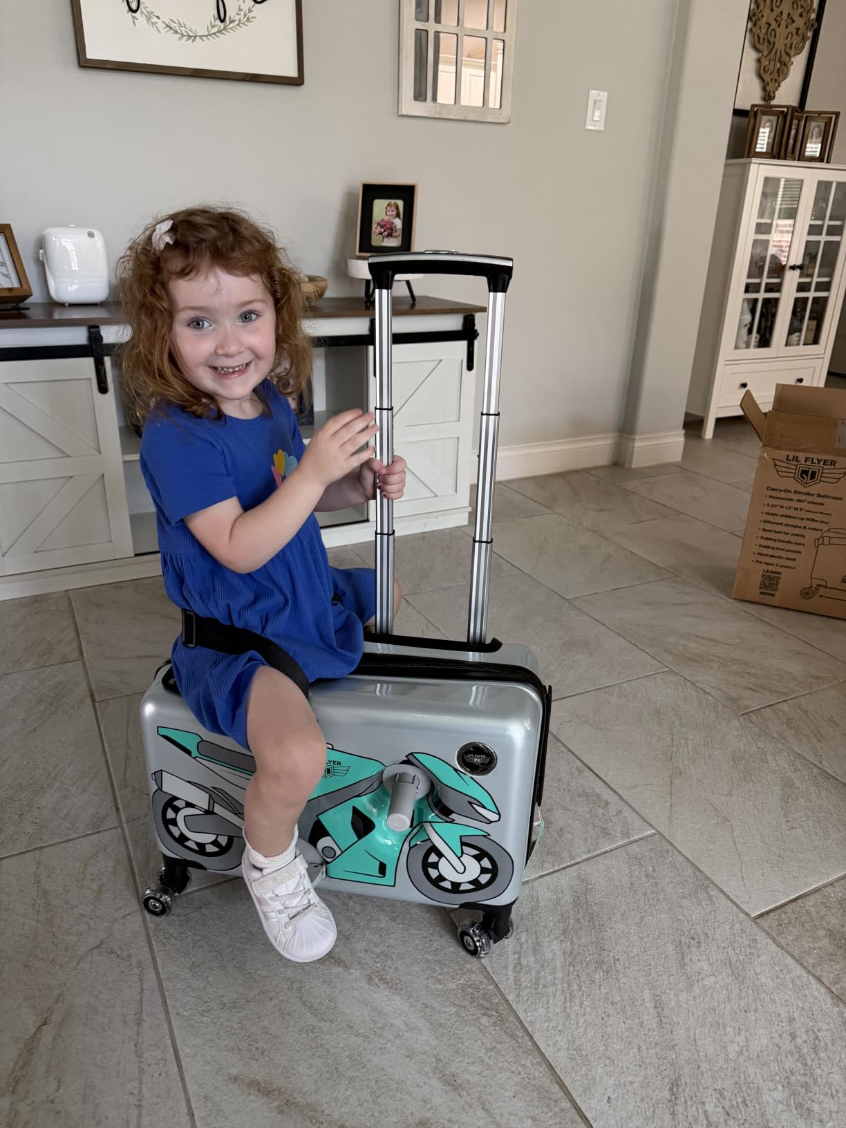 LIL FLYER GO Version 2 Ride On Suitcase for Kids | Carry On Luggage with Toddler Seat, Foldable Handlebars, Pedals, and Removable Wheels | Holds up to 80 lbs | Glam | Ages 2-6 customer photo 1