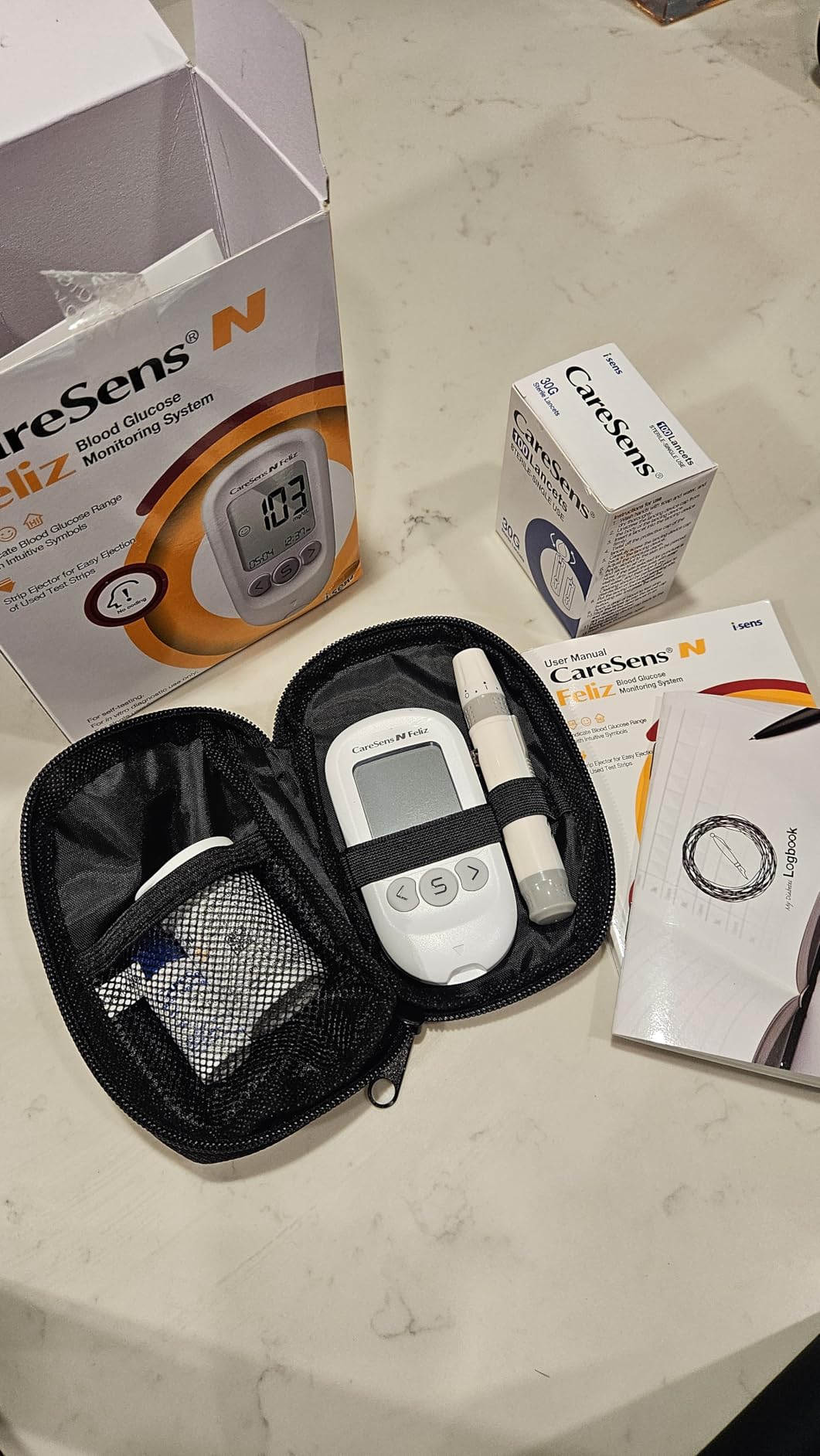 CareSens N Feliz Blood Glucose Monitoring Kit with 100 Blood Sugar Test Strips, 100 Lancets, 1 Blood Glucose Meter, 1 Lancing Device, 1 Control Solution, Travel Case for Diabetes Testing Kit for Personal Use customer photo 1