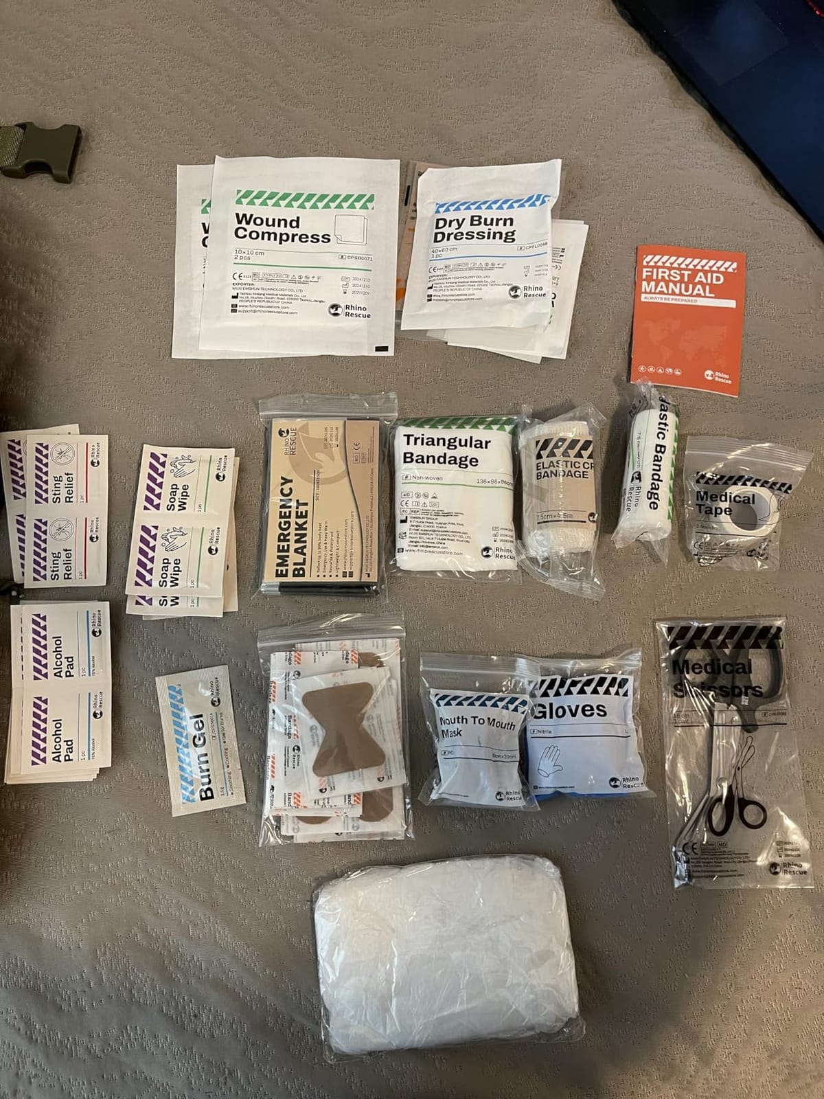 RHINO RESCUE Survival First Aid Kit for Hiking, Backpacking | Portable Size, IFAK Molle Pouch, Essential Outdoor Gear, 100+ First Aid Supplies, 20+ Survival Essentials, HSA/FSA Approved customer photo 1