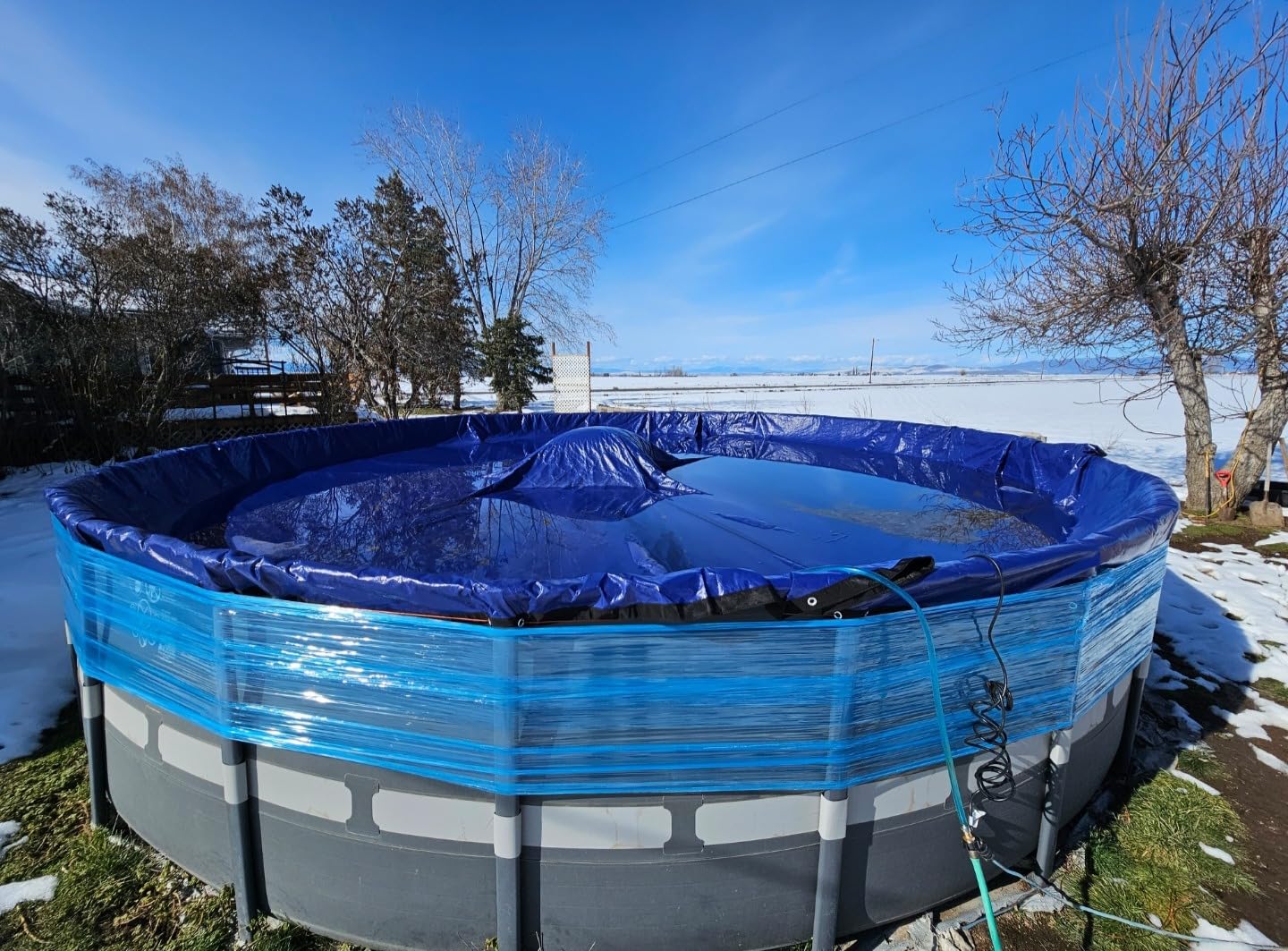 POOLHACKER 2026 Upgrade 24FT Round Winter Pool Cover for Above Ground Pools | 4 Foot Overlap, Extra-Thick 185 GSM Fabric, Handles -10°F Weather, Windproof, Tear-Resistant, Waterproof, UV Protection customer photo 1