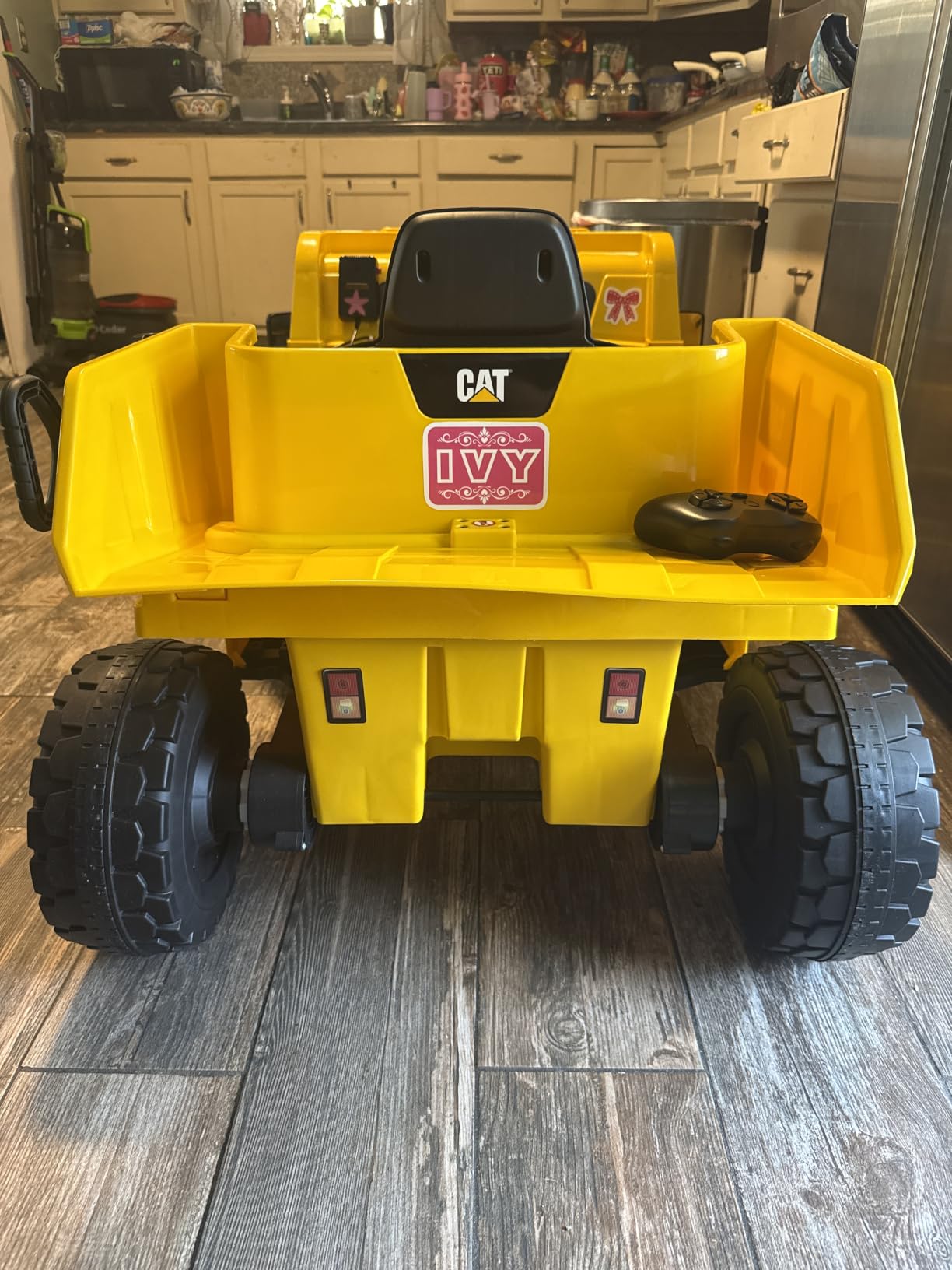 Costzon Ride on Dump Truck, 12V Licensed Caterpillar Kids Electric Vehicle W/Remote Control, Megaphone, Shock Absorbers, Dump Bed, MP3, Ride on Construction Vehicle for Kids, Gift for Boys Girls 3-6 customer photo 1