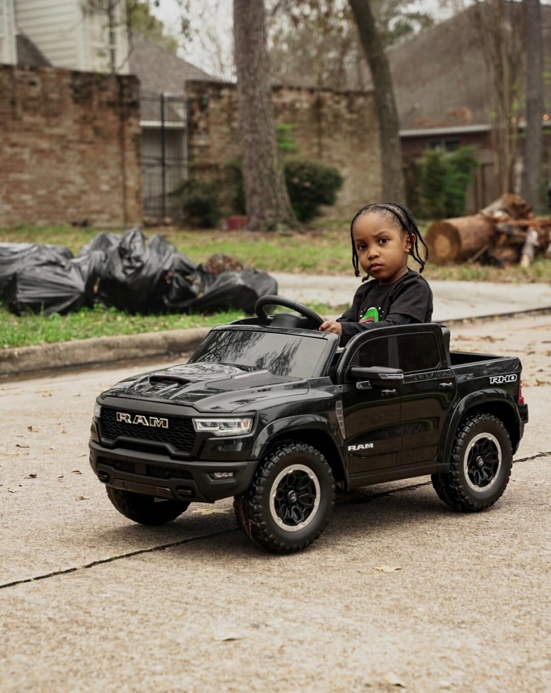 First Ride On 12V Licensed Ram 1500 Ride on Toy for Kids, Toddler Ride on Pickup Truck with Parent Remote Control, Electric Car for Kids with Truck Bed Storage, 3 Point Safety Belt (Black) customer photo 1