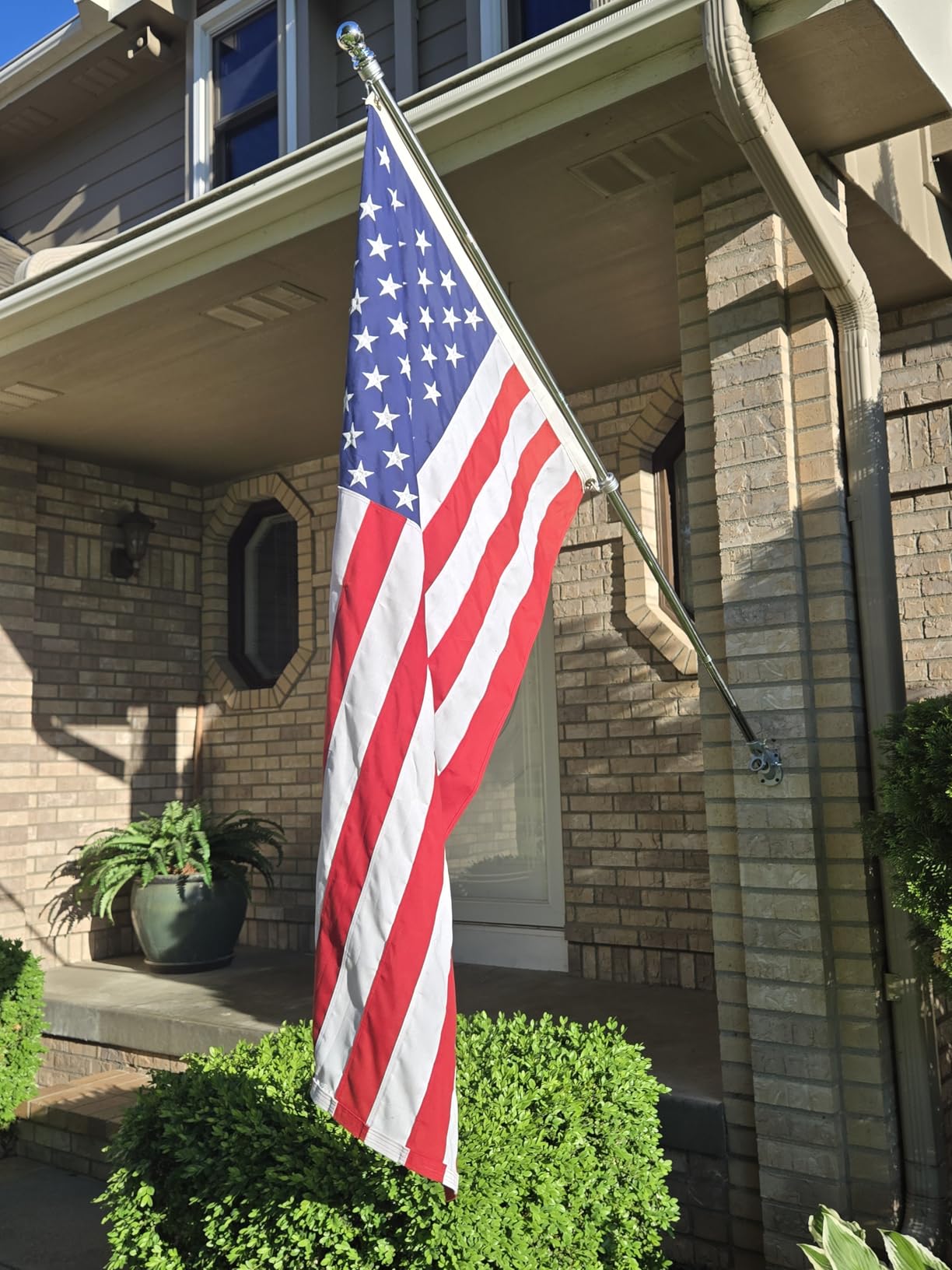Anovo Flag Pole Kit- Stainless Steel 6 FT Flag Poles with1 Inch Metal 360° Rotating Flag Pole Rings Clip, Two-Position Flag Pole Holder Brackets Mounting for Outside House Outdoor Porch (6 FT-Sliver) customer photo 1