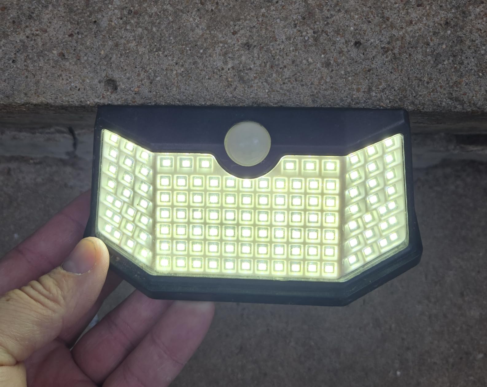 HMCITY 120 LED Outdoor Solar Lights with Motion Sensor and 3 Lighting Modes, IP65 Waterproof Wide Solar Wall Lights Ideal for Garden Patio Yard (Front Button 6Packs, Black Shell-Daylight White) customer photo 1