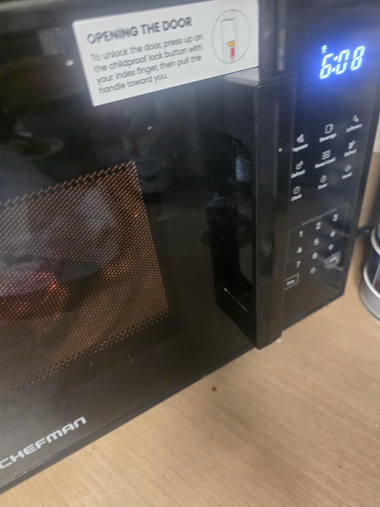 Chefman Countertop Microwave Oven 0.7 Cu. Ft., 700 Watts with 10 Power Levels, 6 Cooking Presets with One-Touch Express Cook, Eco Mode, Child Safety Lock, & Mute Button - Black customer photo 1