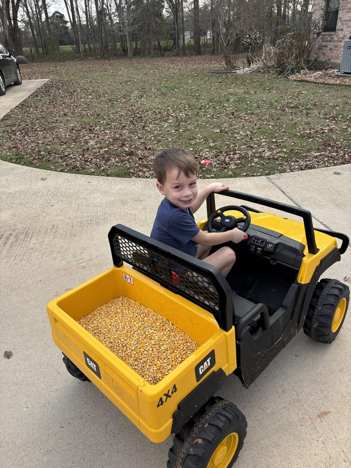 ANPABO Licensed Caterpillar 24V Ride On Toys with Dump Bed and Shovel | 2 seater ride on dump truck, remote control, 4×100w motors, up to 5mph, rear shock absorbers, bluetooth, gift for kids 3-6 customer photo 2