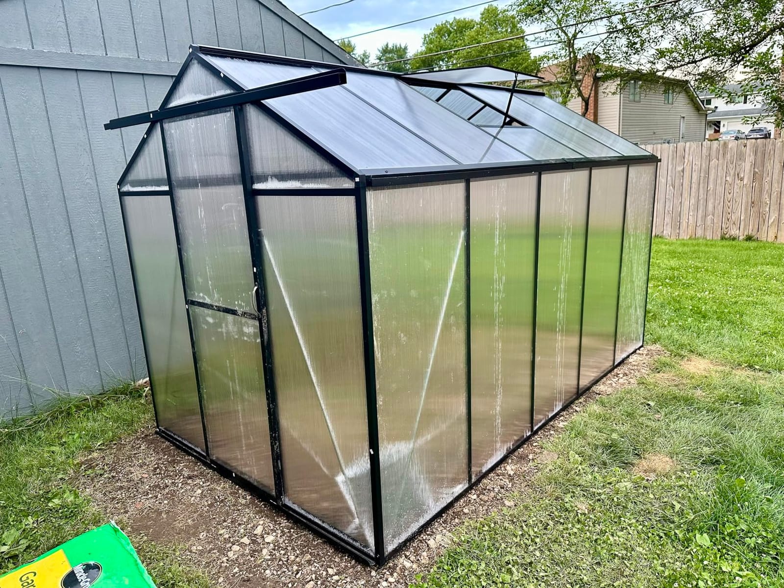 6x10 FT Greenhouse, Easy Assembly Aluminum Polycarbonate Greenhouses for Outdoors with Roof Vent, Large Aluminum Walk-in Greenhouse for Sunroom Patio, Backyard, Garden, Sliding Lockable Door, Black customer photo 1