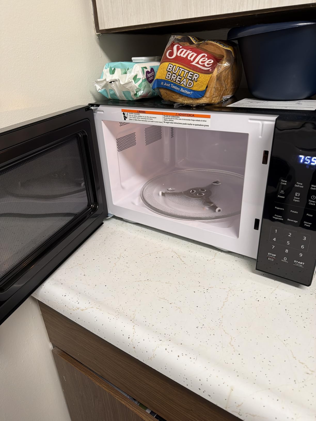 BLACK+DECKER Countertop Microwave Oven 0.7 Cu.Ft, 700W, Child Safety, Black | 6 One-Touch Presets, Express Cooking, 10 Power Levels, Child Safety Lock, Easy Clean Interior customer photo 2