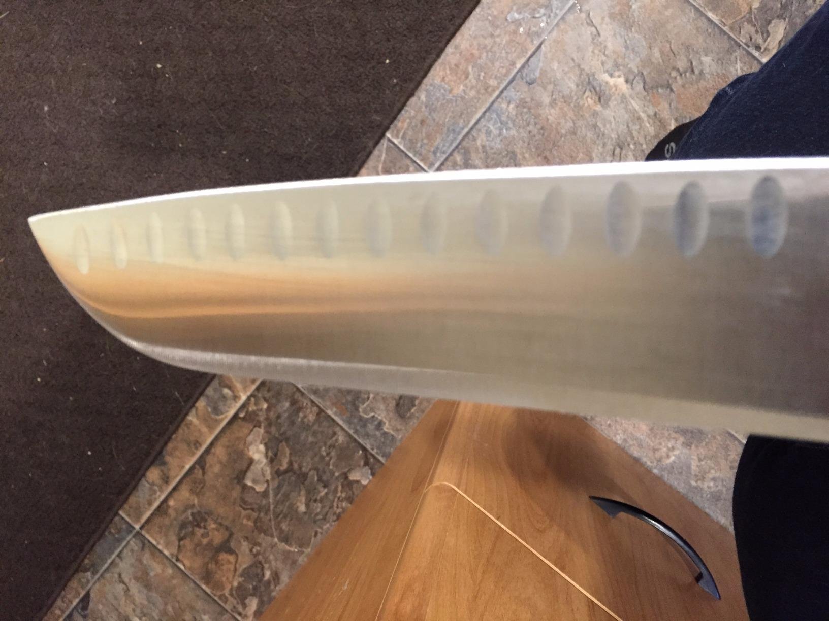 HENCKELS Classic Razor-Sharp Hollow Edge Santoku Knife 7 inch, German Engineered Informed by 100+ Years of Mastery customer photo 1
