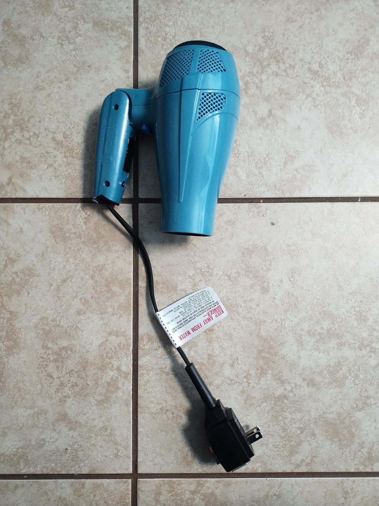 Conair Travel Hair Dryer, Dual Voltage, Folding Handle, 1875W, Blue | Travel blow dryer for at home and on the go, 1.75-lb. design with dual-voltage compatibility and a retractable 5-foot cord customer photo 1