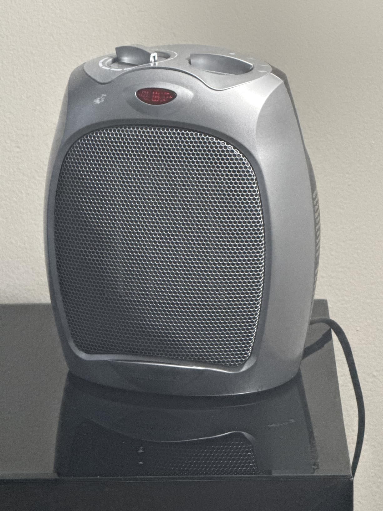 Amazon Basics Ceramic Space Heater, Portable Indoor Heating Solution, With Overheat and Tip-Over Protection, Thermostat, Non-Oscillating, 1500W, 7.52