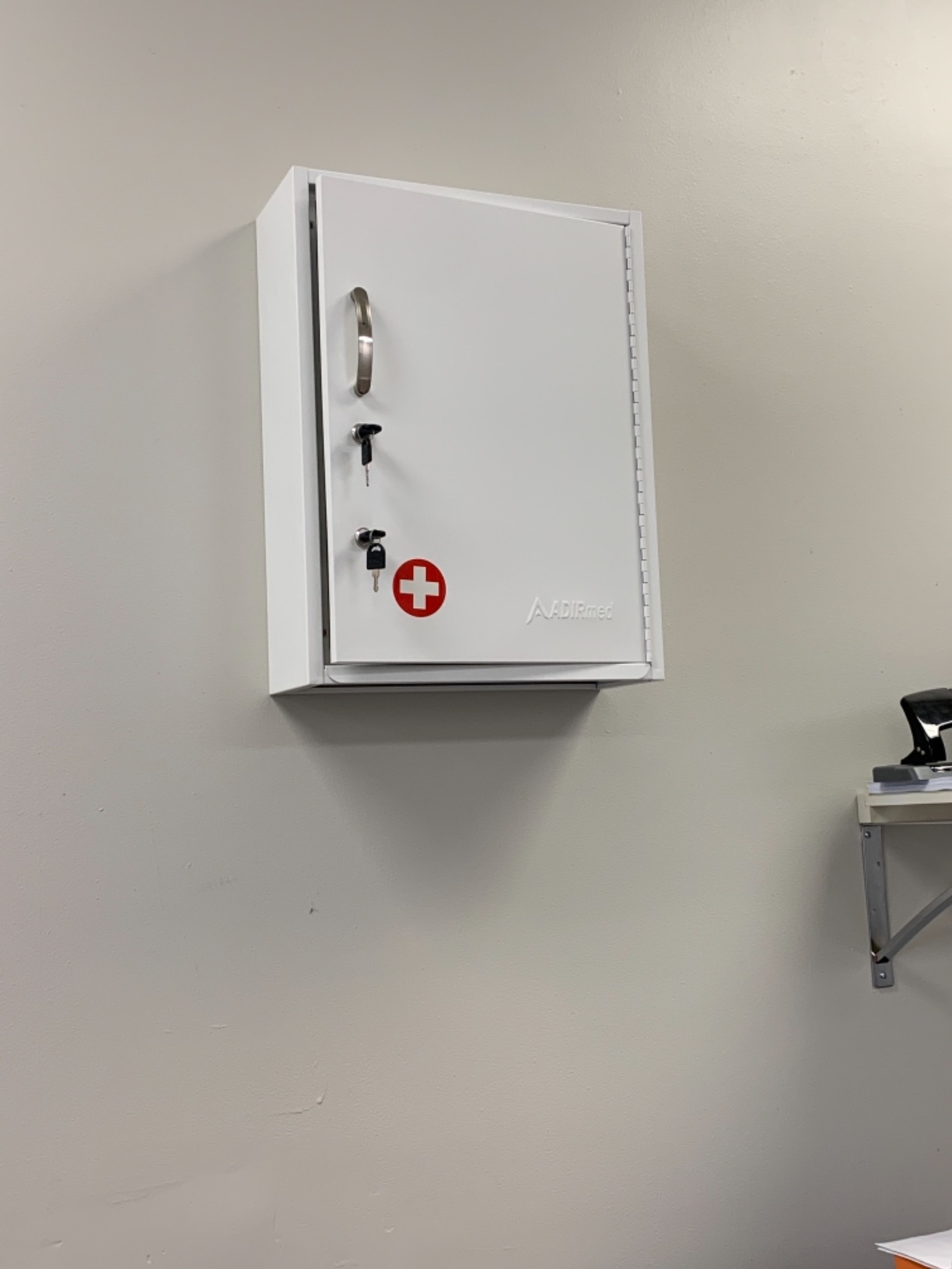 AdirMed White Locking Medication Cabinet with Document Pocket, Metal Wall Mounted Medication Cabinet with Dual Lock and Dual Keys, 21