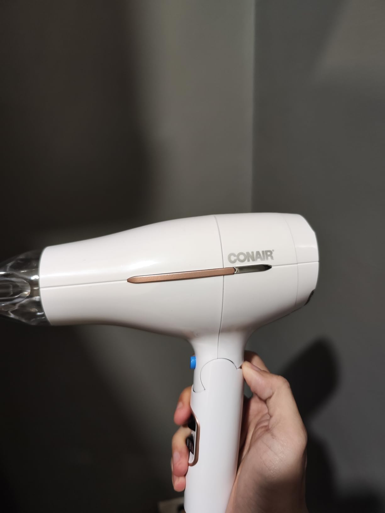 Conair Worldwide Folding Handle Hair Dryer with Concentrator & Diffuser, 1875W Travel Blow Dryer with Smart Voltage Technology, Ionic Conditioning Fights Frizz, 3 Heat & 2 Speed Settings, Purple customer photo 1
