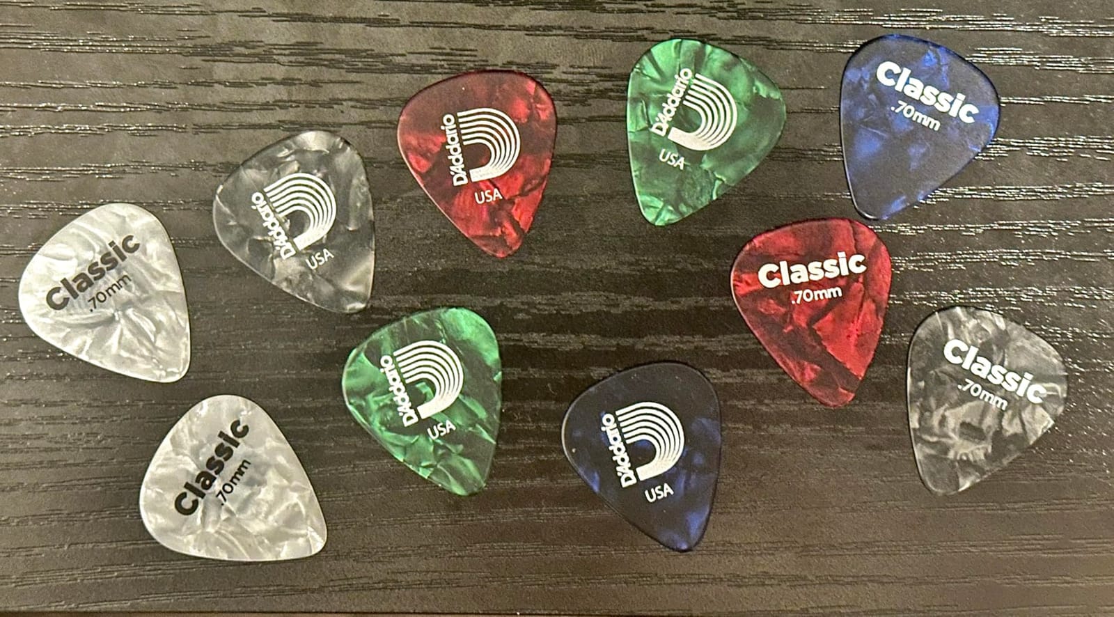 D'Addario Celluloid Guitar Picks - Guitar Accessories - Guitar Picks for Acoustic Guitar, Electric Guitar, Bass Guitar - Natural Feel, Warm Tone - Assorted, Medium 0.70mm, 10-pack customer photo 1
