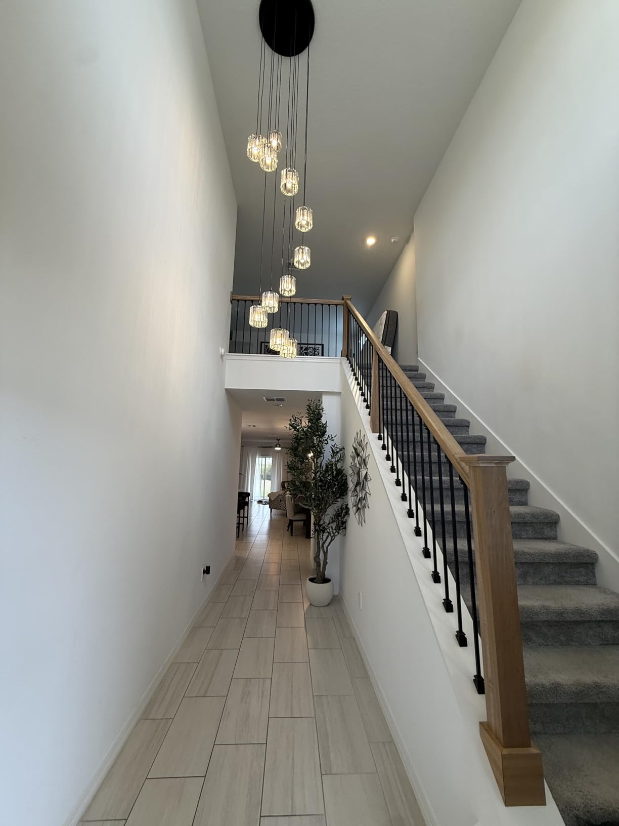 Long Chandeliers for High Ceilings,Modern Crystal Pendant Light,Raindrop Drop Lamp,Hanging Flush Mount Lighting Fixtures for Spiral Staircase,Foyer,Entryway,Living Room,Black (21 Lights) customer photo 2